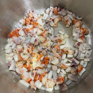 Arroz meloso con bogavante y calamar receta